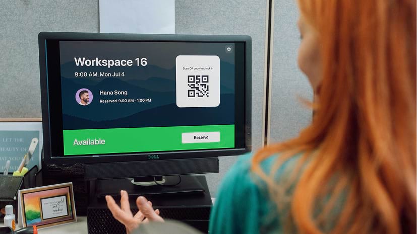 Woman reserving a room on the iPad